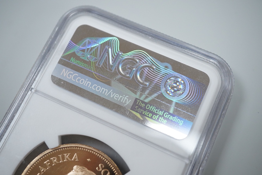 Gold coins, South Africa, 1oz. gold Krugerrand, 2017, NGC encapsulated and graded PF 69 ultra cameo, plastic case scratched